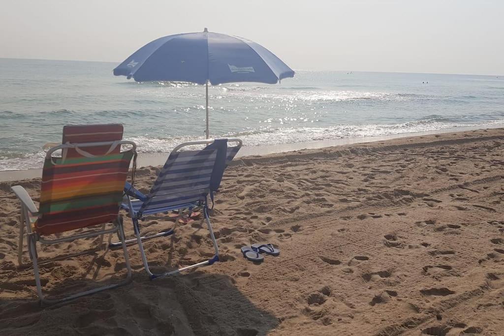 Adosado En La Playa De El Perellonet Con Piscina, Pista Tenis Сasa de vacaciones