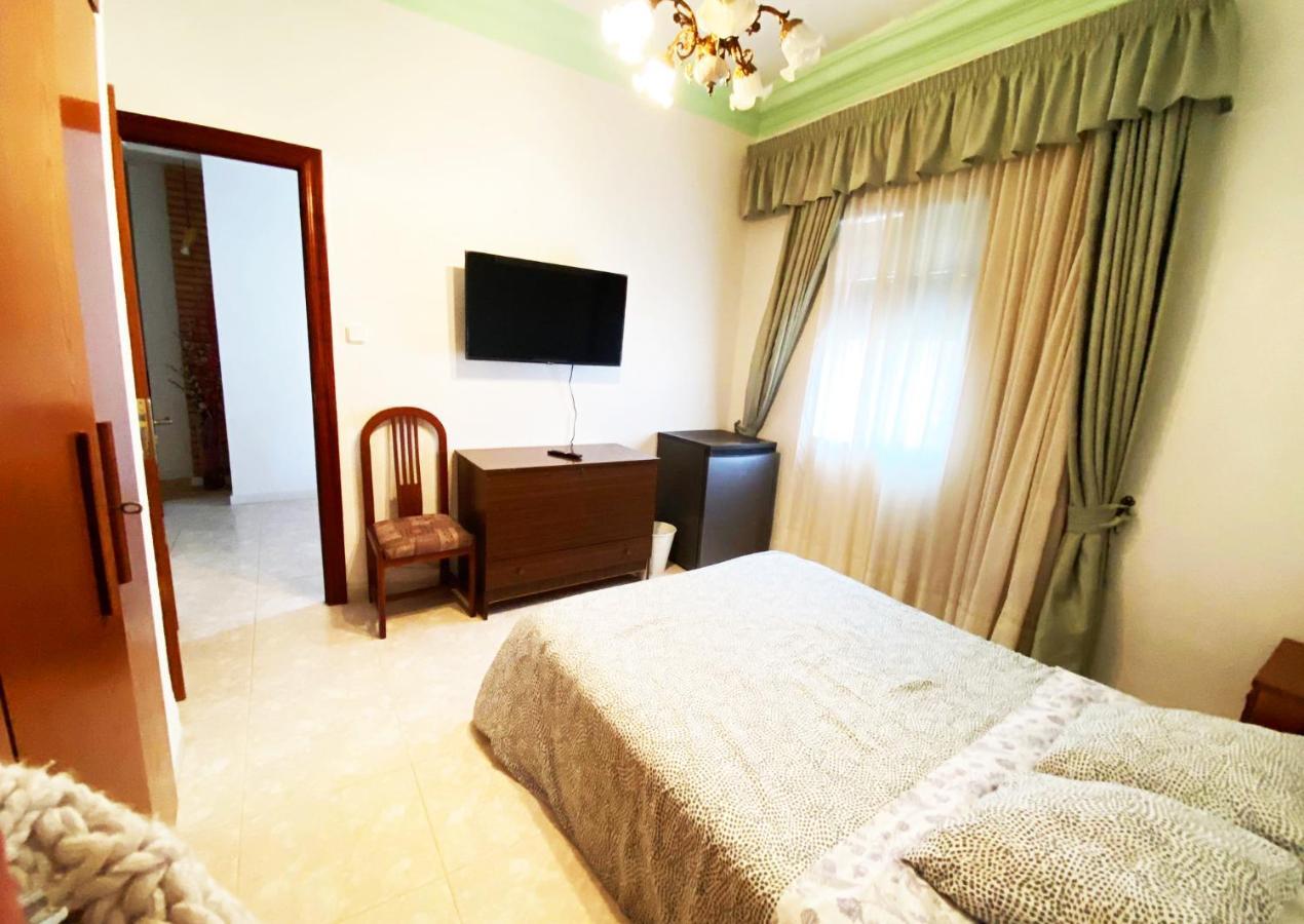 La Malvarrosa In Shared Habitación en casa particular